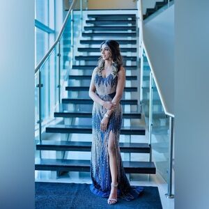 Beautiful royal blue embellished, high slit gown.